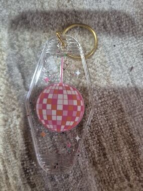 Clear Keychain Phone Accessory with Pink Disco Ball Design